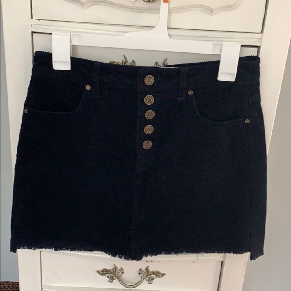Corduroy mini skirt with buttons and frayed edge